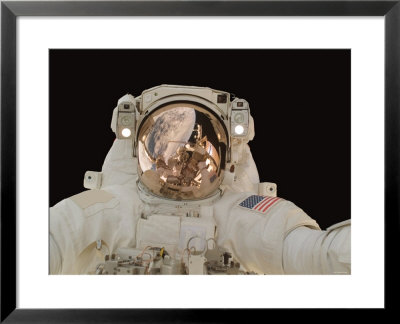 International Space Station Components Reflected In Astronaut's Helmet, October 30, 2007 by Stocktrek Images Pricing Limited Edition Print image