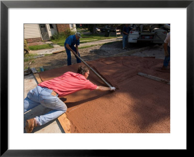 Red-Tinted Concrete Is Smoothed As A New Driveway by Joel Sartore Pricing Limited Edition Print image