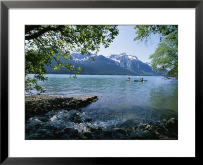 Paddlers Kayak On Chilkoot Lake In Haines, Alaska by Rich Reid Pricing Limited Edition Print image