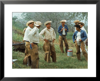 Cowboys On The King Ranch Stand Around During A Break From Rounding Up Cattle by Ralph Crane Pricing Limited Edition Print image