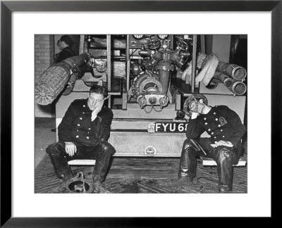 London Auxiliary Fire Service Crew Members Catch Nap On Tail Of A Fire Truck by William Vandivert Pricing Limited Edition Print image