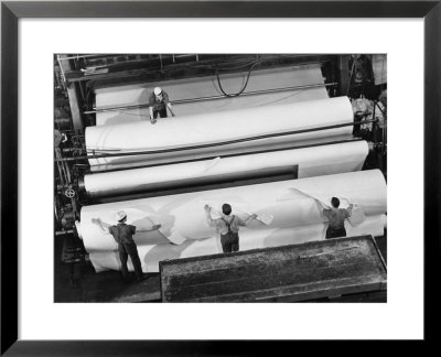 20 Ft. Roll Of Finished Paper Arriving On The Rewinder, Ready To Be Cut And Shipped From Paper Mill by Margaret Bourke-White Pricing Limited Edition Print image
