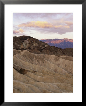 Twilight View From Zabriskie Point Over Eroded Hills In Death Valley by Phil Schermeister Pricing Limited Edition Print image