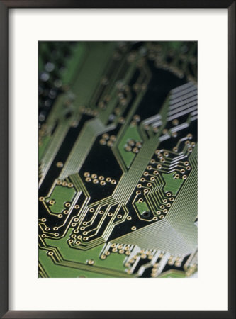 A Close View Of A Silicon Circuit Board From A Computer by Taylor S. Kennedy Pricing Limited Edition Print image