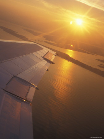 View Of Sun And Water From An Airplane Window by Oote Boe Pricing Limited Edition Print image