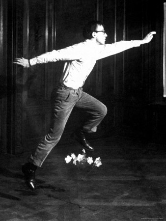 Woody Allen, Jumping Over Flowers From New Year's Eve by Arthur Schatz Pricing Limited Edition Print image