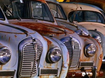 Derelict Old Austin Cars, New Zealand by John Banagan Pricing Limited Edition Print image