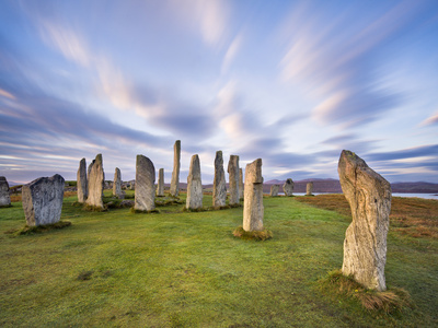 The Lewisian Gneiss Stone Circle At Callanish On An Early Autumnal Morning, Isle Of Lewis, Outer He by Lizzie Shepherd Pricing Limited Edition Print image