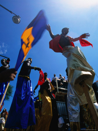 Stilt-Walkers On Caribbean Day Parade In Brooklyn, New York City, Usa by Corey Wise Pricing Limited Edition Print image
