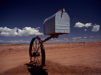 Mailbox Attached To Wheel By A Chain by Ted Dayton Pricing Limited Edition Print image