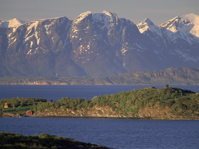 Sunset At Harbor Island, Harstad, Norway by Walter Bibikow Pricing Limited Edition Print image