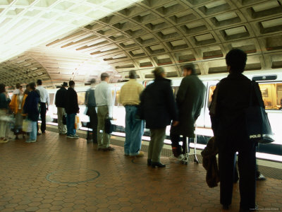 Commuters On Platform At Metro Station by Eddie Brady Pricing Limited Edition Print image