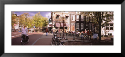 People At A Sidewalk Cafe, Amsterdam, Netherlands by Panoramic Images Pricing Limited Edition Print image