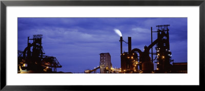 Light Illuminated On An Industrial Building, Ashland, Kentucky, Usa by Panoramic Images Pricing Limited Edition Print image