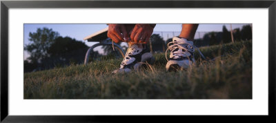 Man Tying His Shoe Lace, Illinois, Usa by Panoramic Images Pricing Limited Edition Print image