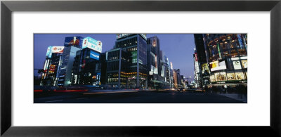 Low Angle View Of A Building Lit Up At Dusk, Tokyo Prefecture, Japan by Panoramic Images Pricing Limited Edition Print image