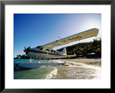 Float Plane On Beach, Hayman Island Resort, Whitsundays, Hayman Island, Queensland, Australia by Holger Leue Pricing Limited Edition Print image