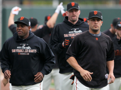 Texas Rangers V San Francisco Giants, Game 2: Juan Uribe, Aubrey Huff, Andres Torres by Justin Sullivan Pricing Limited Edition Print image