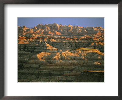 Sunset On The Geological Formations Of The Badlands by Annie Griffiths Belt Pricing Limited Edition Print image