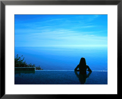 Silhouette Of Woman In Infinity Pool At Post Ranch Inn, Big Sur, Monterey Bay, Usa by Holger Leue Pricing Limited Edition Print image