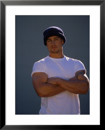 Portrait Of A Man Wearing Beanie Hat And Tshirt by Lonnie Duka Pricing Limited Edition Print image