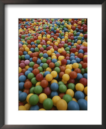 A Rainbow-Colored Landslide Of Toy Balls In Abstract Patterns by Stephen St. John Pricing Limited Edition Print image