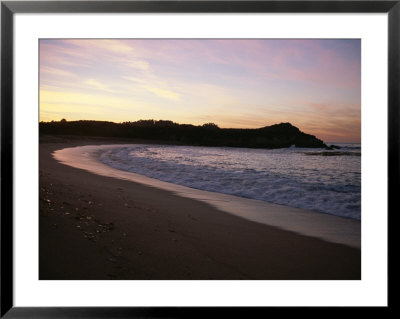 Sunset Reflecting On Beach With Surf Rolling In by Todd Gipstein Pricing Limited Edition Print image