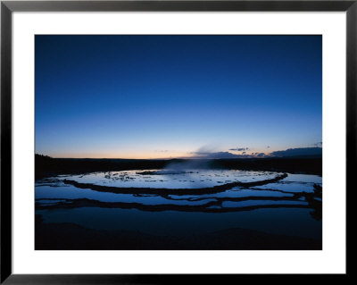 Sunset At Great Fountain Geyser In Yellowstone National Park by Norbert Rosing Pricing Limited Edition Print image