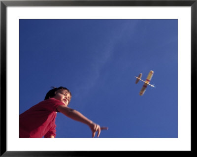 Boy Flying Toy Airplane by Kevin Leigh Pricing Limited Edition Print image