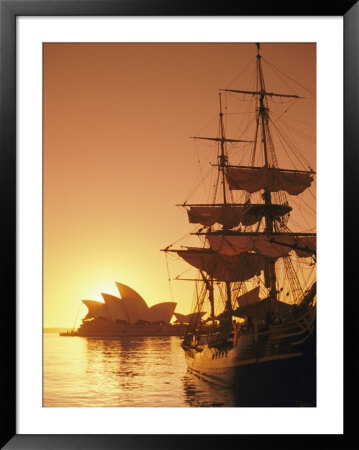 Sydney Opera House And The Hms Bounty, A Replica Of The Famous Ship, Silhouetted By The Setting Sun by Richard Nowitz Pricing Limited Edition Print image