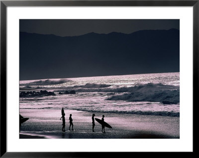 Surfers At Sunset, Ehukai, Oahu, Hawaii by Bill Romerhaus Pricing Limited Edition Print image