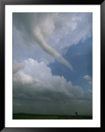 A Funnel Cloud Reaches Towards Earth From The Sky by Peter Carsten Pricing Limited Edition Print image