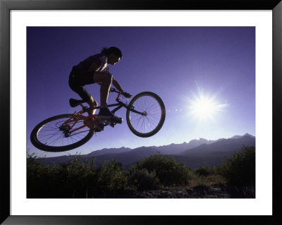 Man On Mountain Bike In Mid-Air by Mark Thayer Pricing Limited Edition Print image
