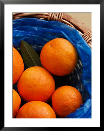 Basket Of Oranges, Greece by Steve Outram Pricing Limited Edition Print image