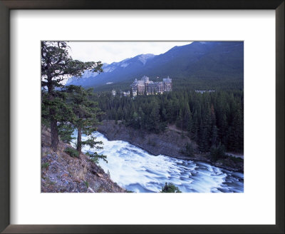 Banff, The Bow Falls And Prestigious Banff Springs Hotel, At Dusk, Alberta, Canada by Ruth Tomlinson Pricing Limited Edition Print image