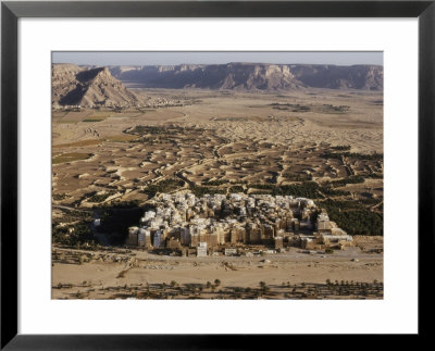Aerial View Of Shibam With Its Many Mud-Brick Skyscrapers, Some Of Which Are Centuries Old by Thomas J. Abercrombie Pricing Limited Edition Print image
