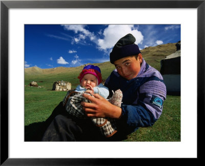 Boy And Baby In Front Of Yurt Camp, Kyrgyzstan by Anthony Plummer Pricing Limited Edition Print image
