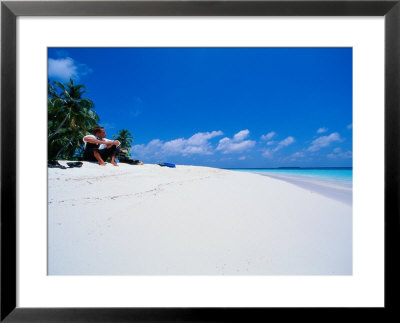 Businessman On Beach, Maldives by Stuart Westmoreland Pricing Limited Edition Print image