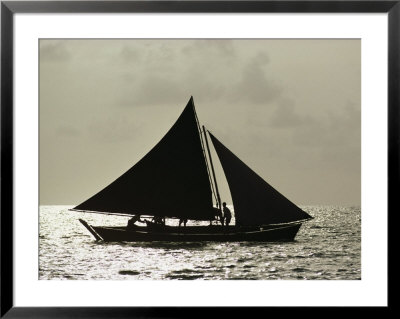 Silhouetted Cat Boat On A Sea Of Silver At Twilight by Bill Curtsinger Pricing Limited Edition Print image