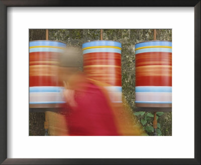 Buddhist Monk Passing Prayer Wheels, Mcleod Ganj, Dharamsala, Himachal Pradesh State, India, Asia by Jochen Schlenker Pricing Limited Edition Print image