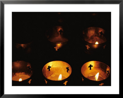 Votives Burn In A Darkened Church In Santa Fe by Raul Touzon Pricing Limited Edition Print image