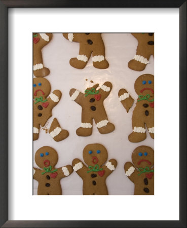 A Sheet Of Gingerbread Men With Different Facial Expressions by Joel Sartore Pricing Limited Edition Print image