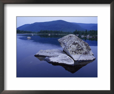 Still Waters, Evergreen Forests, And A Mountain Skyline Enframe Baxter State Park, Maine by Phil Schermeister Pricing Limited Edition Print image