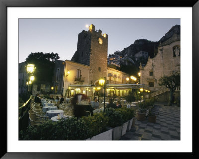 Outdoor Cafe/Restaurant At Twilight With Diners by Richard Nowitz Pricing Limited Edition Print image