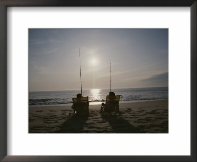Fishermen In Beach Chairs Wait For A Bite Along The Ocean Shore by Stephen St. John Pricing Limited Edition Print image