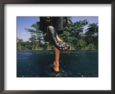 A Person Runs On A Recently Tarred Road by Steve Winter Pricing Limited Edition Print image