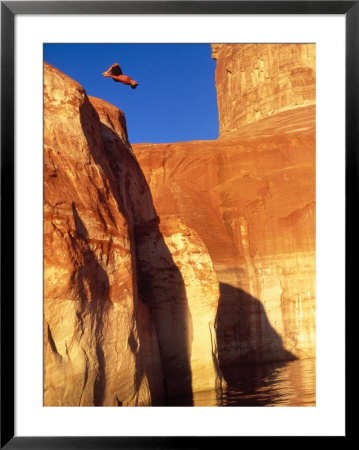 Person Jumping Off Cliff by Rob Gracie Pricing Limited Edition Print image
