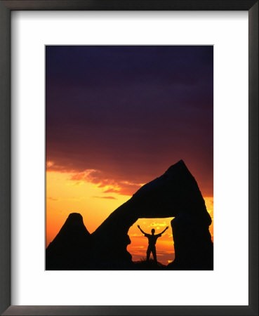 Man Silhouetted In Rock Opening At Sunset, Goreme, Nevsehir, Turkey by Anders Blomqvist Pricing Limited Edition Print image