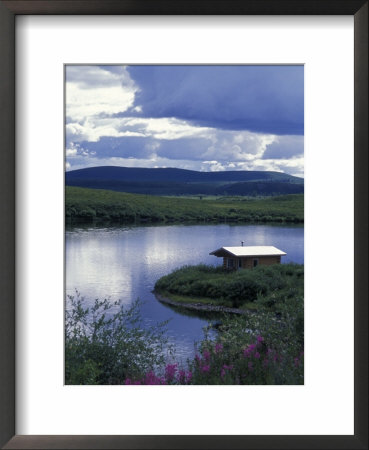 Tangle Lakes Landscape With Cabin And Storm Clouds On Denali Highway, Alaska by Rich Reid Pricing Limited Edition Print image