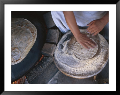 Israel: Woman Baking Bread by Brimberg & Coulson Pricing Limited Edition Print image
